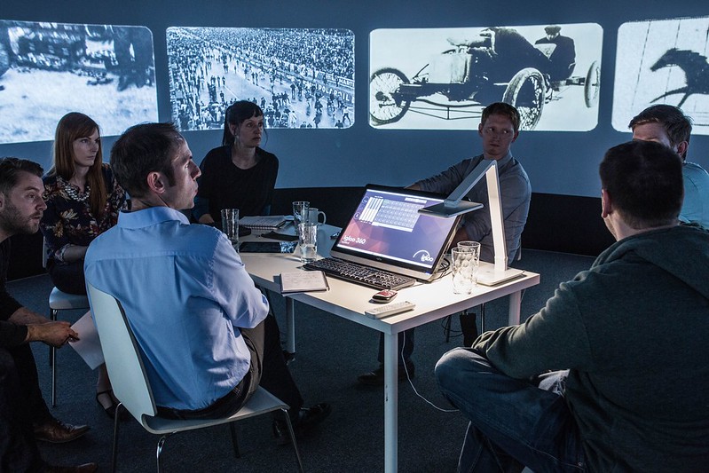 A team working together inside an Igloo immersive space