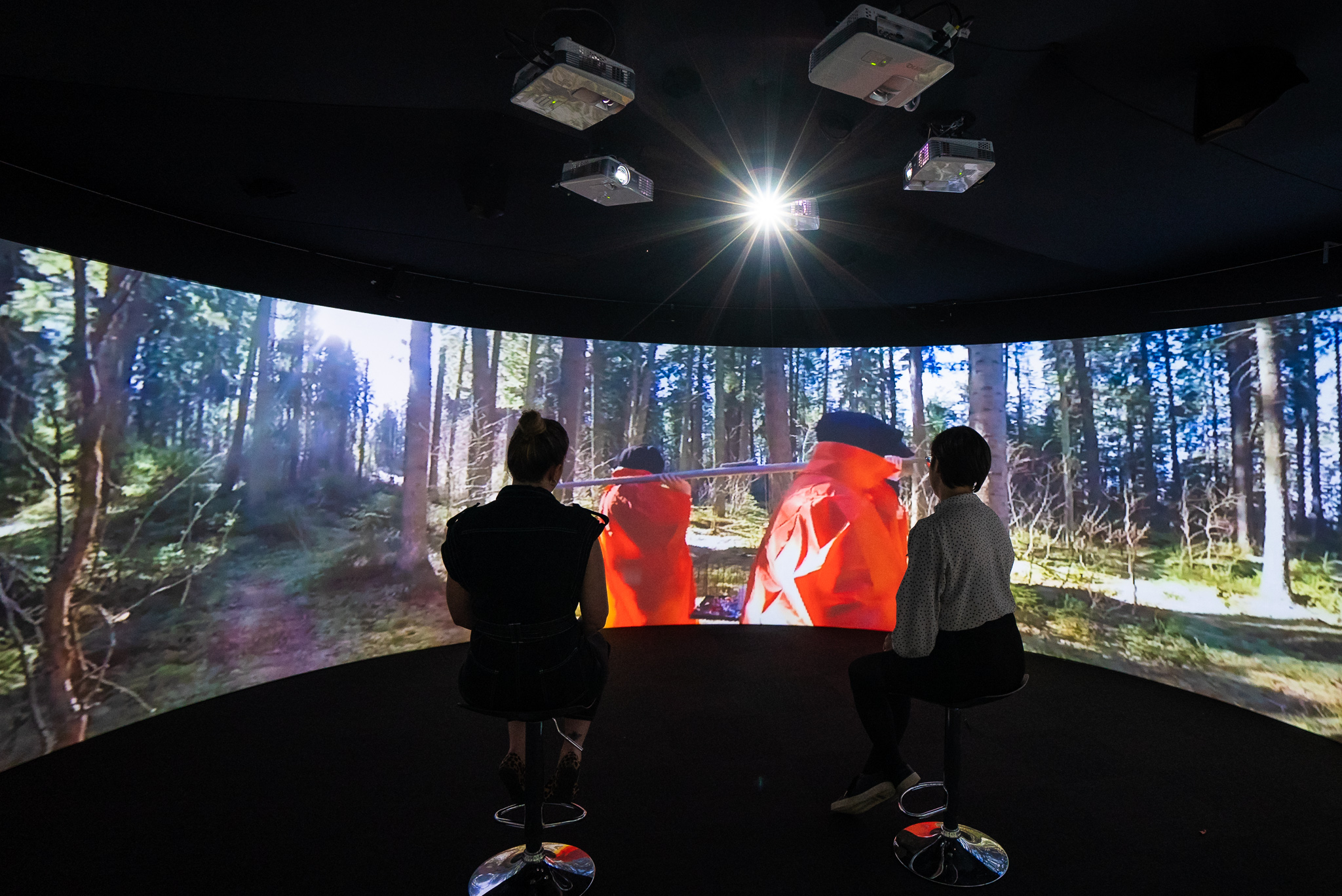 Two people looking at Igloo wrap around technology