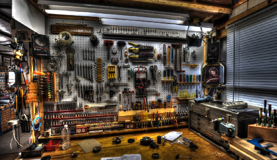 A workshop with all its tools elegantly arranged within easy reach.