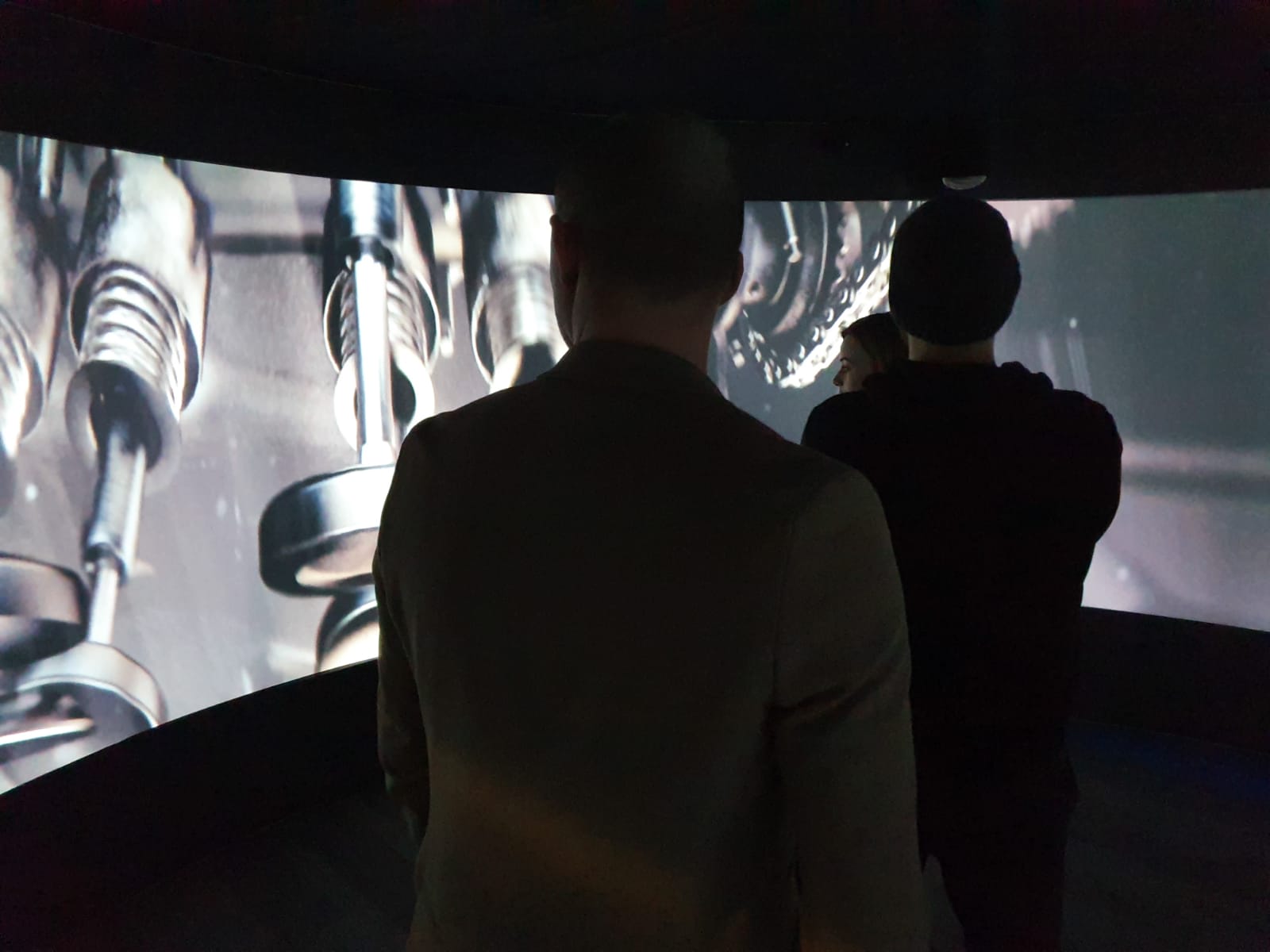 Three people looking at Igloo Vision screens