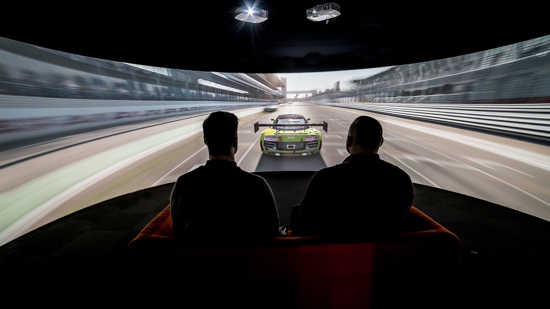 people watching a race in an igloo room